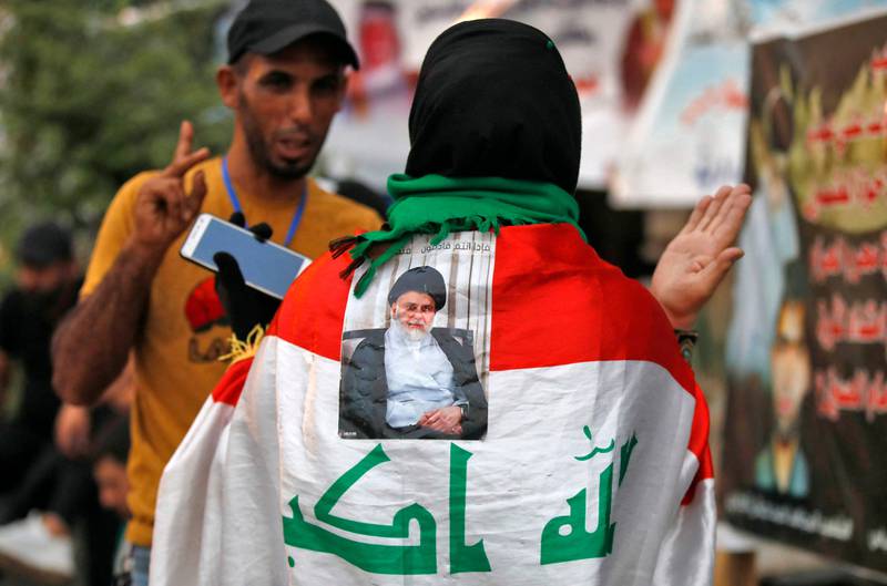 Supporters of Iraqi Shiite cleric Moqtada Al Sadr outside the Iraqi parliament building in Baghdad on August 16. AFP
