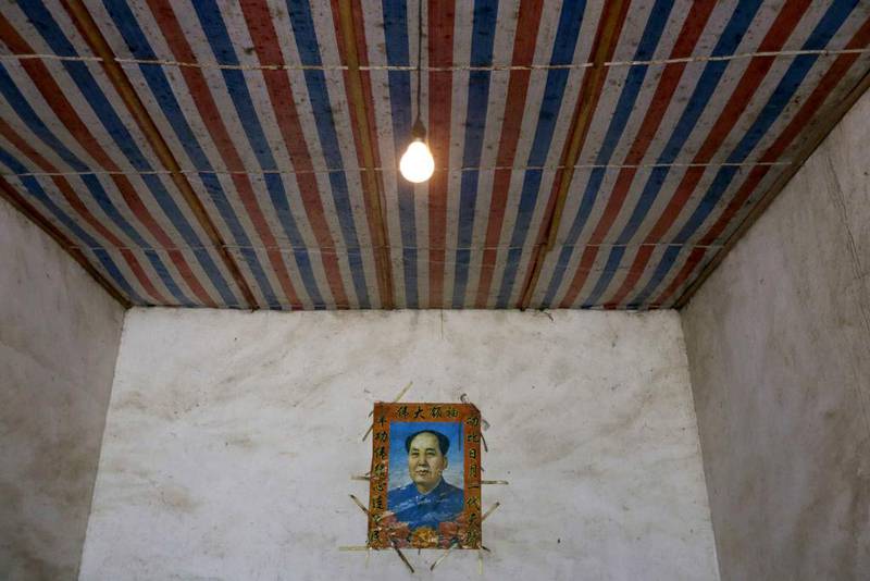 A portrait of China’s late Chairman Mao Zedong is seen at Gong Zhaoyuan’s home at Heshan village, in Shimen county. Jason Lee / Reuters