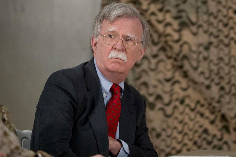 National Security Adviser John Bolton attends a meeting with President Donald Trump and senior military leadership at Al Asad Air Base, Iraq, Wednesday, Dec. 26, 2018. President Donald Trump made an unannounced trip to Iraq on Wednesday to meet U.S. troops. It's the sixth time that a U.S. president has visited Iraq. (AP Photo/Andrew Harnik)