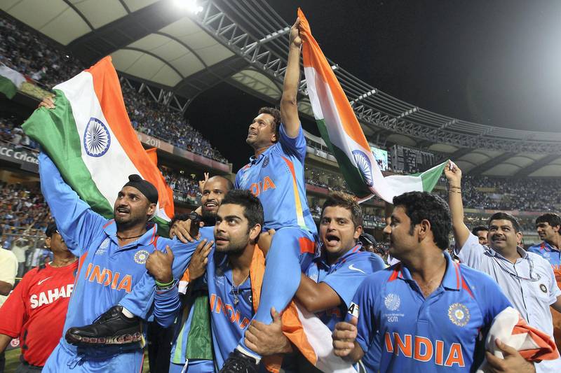 MUMBAI, INDIA - APRIL 02:  Sachin Tendulkar of India is lifted by his team mates on a lap of honour after their six wicket victory during the 2011 ICC World Cup Final between India and Sri Lanka at Wankhede Stadium on April 2, 2011 in Mumbai, India.  (Photo by Michael Steele/Getty Images)