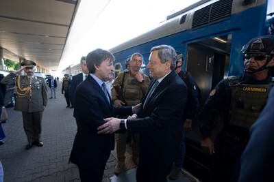 Italian ambassador to Ukraine Pier Francesco Zazo (L) welcomes Italian Prime Minister Mario Draghi to Kyiv. EPA 