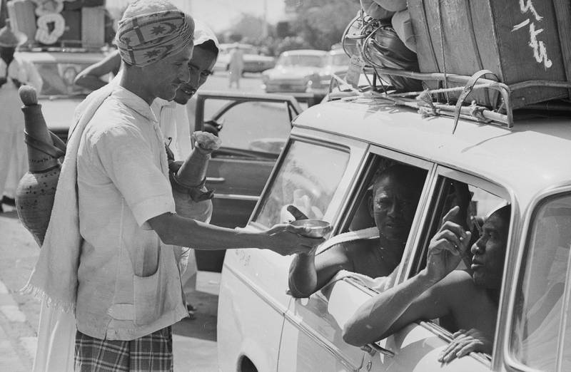 Street traders sell drinks to Hajj pilgrims in Makkah in August 1968.