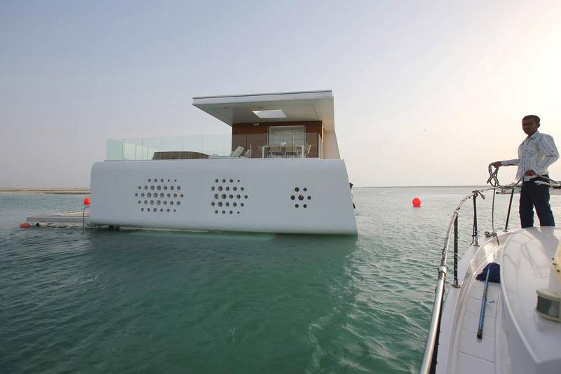 The project was launched by developer The Kleindienst Group at the Dubai International Boat Show last March. Each villa, designed and manufactured on a dry dock in Dubai Maritime City, will have three levels — one underwater, one at sea level, and an upper deck — with a submerged master bedroom and bathroom. They are also equipped with a kitchen, dining area, and a glass-bottomed Jacuzzi. Kamran Jebreili / AP Photo