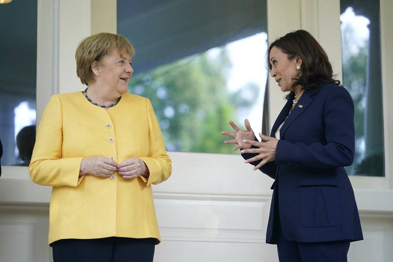 Kamala Harris greets German Chancellor Angela Merkel as she arrives at the vice president's residence, the Naval Observatory, on July 15th, 2021. AP
