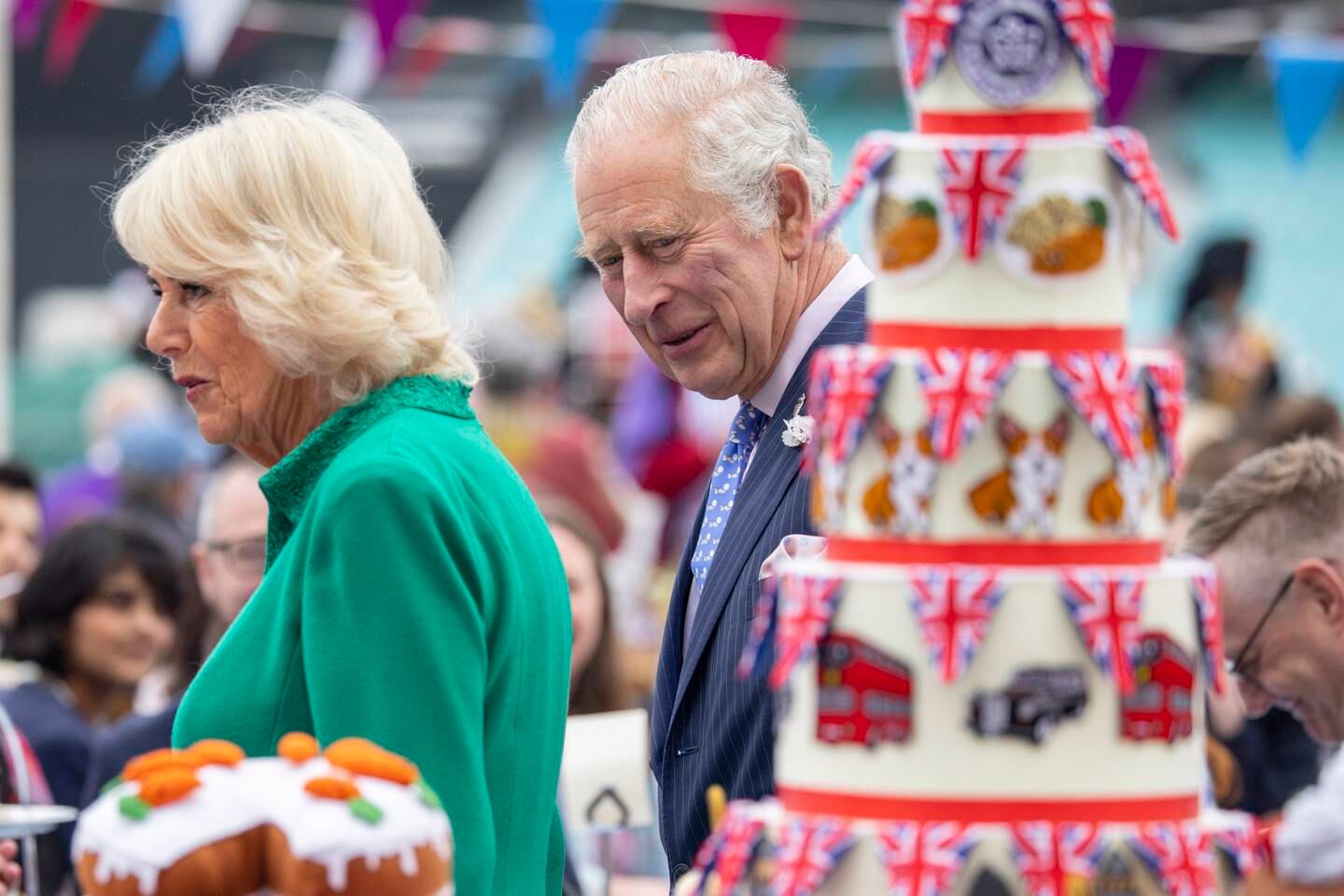 Prince Charles and Camilla Duchess of Cornwall examine jubilee cakes at the Oval Kennington cricket ground. Street and garden parties across the UK have celebratd Queen Elizabeth II's platinum jubilee.  EPA 