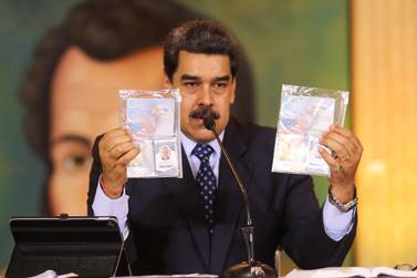 Venezuelan President Nicolas Maduro holds the passports of two US citizens arrested by security forces. AFP