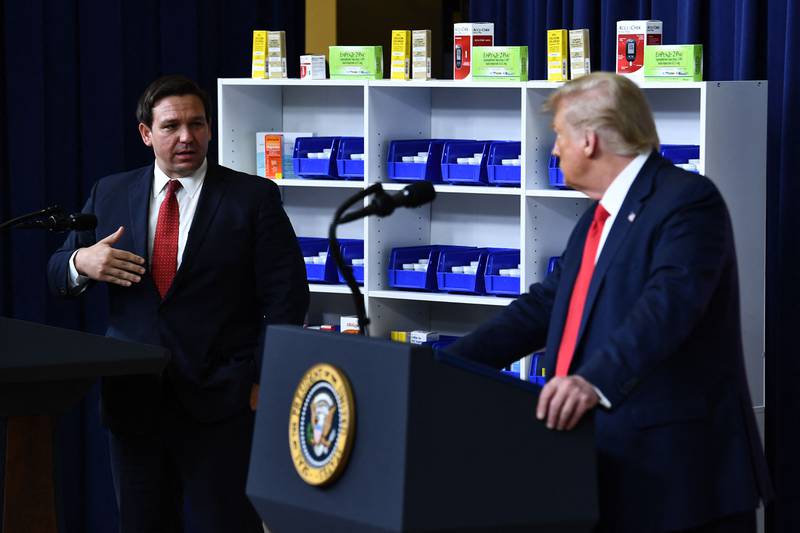 Then US president Donald Trump listens as Florida Governor Ron DeSantis in Washington in 2020. Trump could face a primary challenge from DeSantis in 2024. AFP