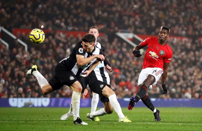 Manchester United's Paul Pogba takes a shot against Newcastle United at Old Trafford. PA