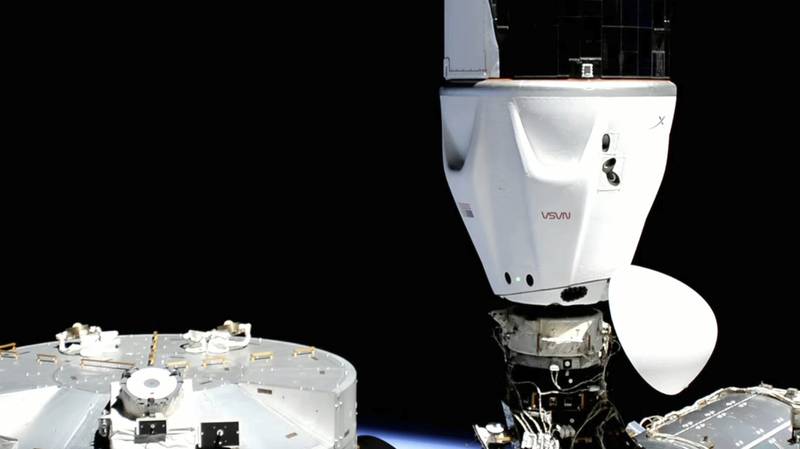 A Crew Dragon capsule docked at the International Space Station, April 2022. Photo: Space X / AP
