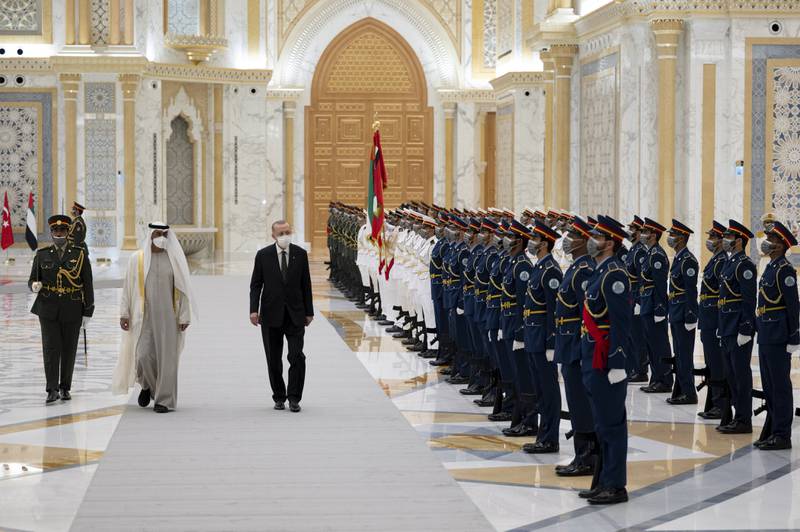 Sheikh Mohamed and Mr Erdogan are greeted by a military guard of honour.
