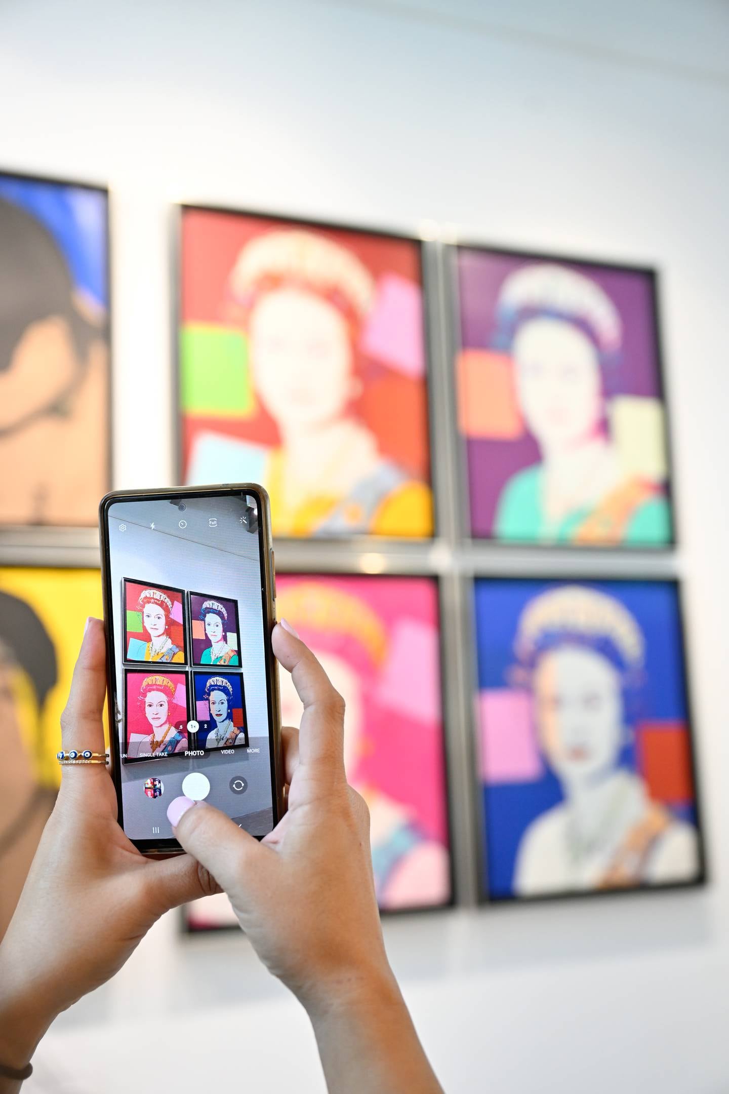 Andy Warhol's series of renowned coloured portraits of Queen Elizabeth II is on show at Sotheby's Dubai. Photo: Sotheby's