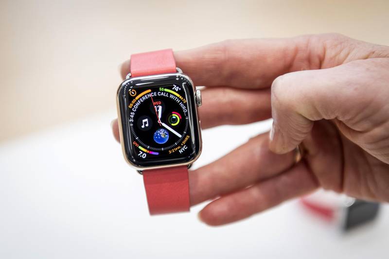 An attendee displays an Apple watch series 4 during an Apple Inc. event at the Steve Jobs Theater in Cupertino, California, U.S., on Wednesday, Sept. 12, 2018. Apple Inc. took the wraps off a renewed iPhone strategy on Wednesday, debuting a trio of phones that aim to spread the company's latest technology to a broader audience. Photographer: David Paul Morris/Bloomberg
