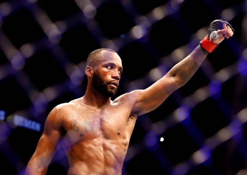 Leon Edwards celebrates after defending his UFC welterweight title against Kamaru Usman at UFC 286 in London on March 18, 2023. Reuters