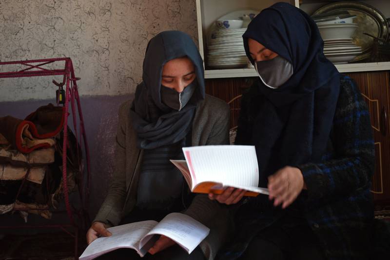 Marwa, left, would have been the first woman in her family to go to university were it not for the Taliban. AFP