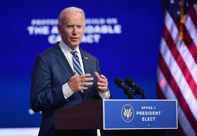 US President-elect Joe Biden delivers remarks at The Queen in Wilmington, Delaware, on November 10, 2020. President-elect Joe Biden said November 10, 2020 he had told several world leaders that "America is back" after his defeat of Donald Trump in last week's bitterly contested US election. / AFP / Angela Weiss
