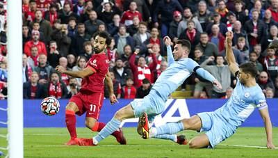 Mohamed Salah of Liverpool scores to make it 2-1 against Manchester City. EPA