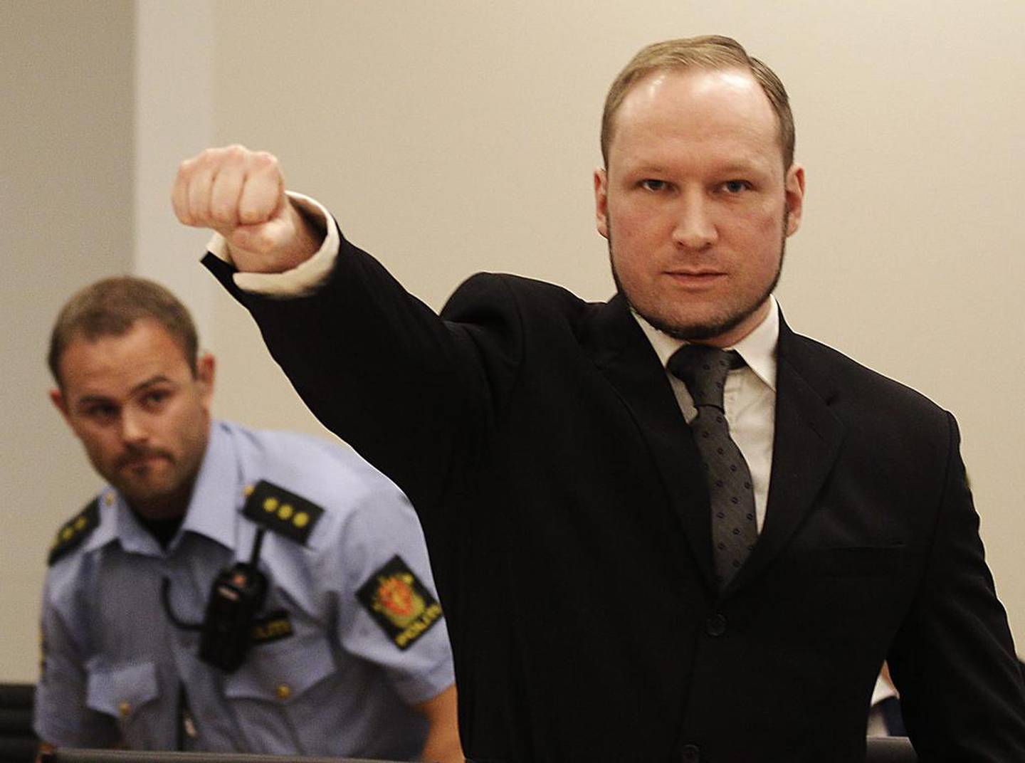 Far-right terrorist Anders Behring Breivik makes a salute in an Oslo courtroom after the 2011 atrocity. AP