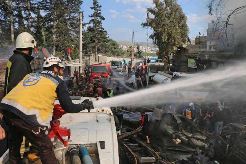 The scene of a fuel truck bomb which killed 46 people including at least six Turkey-backed rebel fighters on April 28, 2020 in the northern Syrian city of Afrin. AFP, HO via Syrian Civil Defence