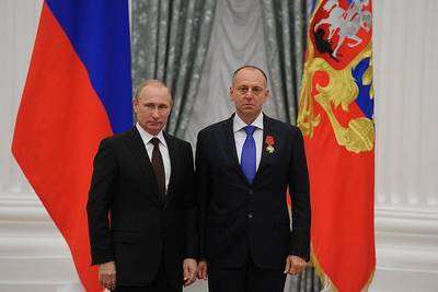 Russian President Vladimir Putin with Mr Pumpyanskiy in July 2014. Photo: Kremlin.ru