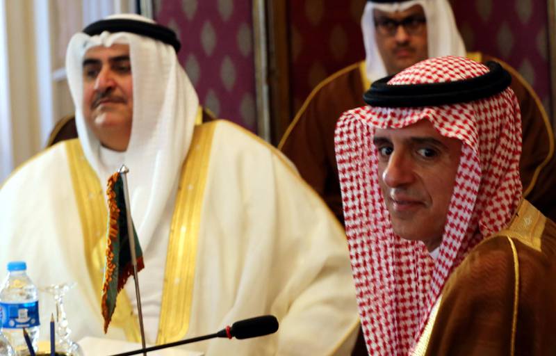 Saudi foreign minister Adel Al Jubeir, right, and Bahraini foreign minister Khalid bin Ahmed Al Khalifa look on during the meeting. Khaled Elfiqi / Pool