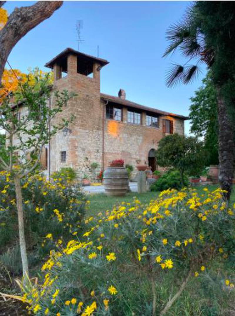 The farmhouse, located near Rome, is situated in the stunning Italian countryside. Courtesy Airbnb