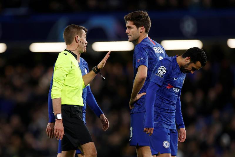 Chelsea's Marcos Alonso is sent off by referee Clement Turpin. Reuters