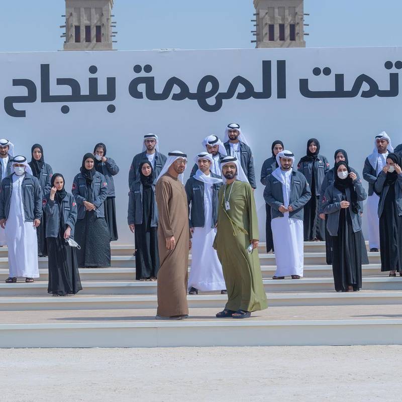 Sheikh Mohammed bin Rashid and Sheikh Mohamed bin Zayed stand for a photo with the UAE Mars Mission team at Bab Al Shams arena in Dubai. Courtesy: Sheikh Hamdan bin Mohammed Twitter