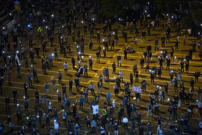 Thousands of Israelis gather at an Anti-Corruption rally under coronavirus restrictions. Getty Images