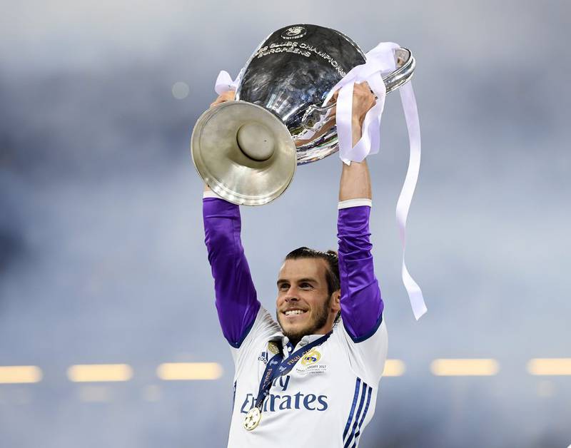Gareth Bale of Real Madrid lifts the Champions League trophy after his side beat Juventus 4-1 in the final in Cardiff in 2017. Getty