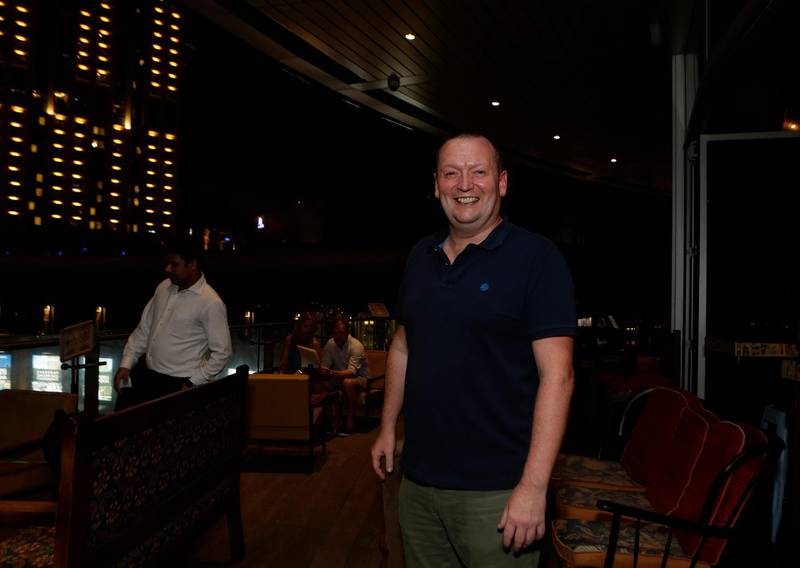 Dubai, United Arab Emirates - October 13, 2016.  Chris Battle ( 46 years old from UK and Commercial Manager ) spearhead the Property Hub Dubai meet up at The Scene.  ( Jeffrey E Biteng / The National )  Editor's Note;  ID 19421 *** Local Caption ***  JB131016-Chris02.jpg
