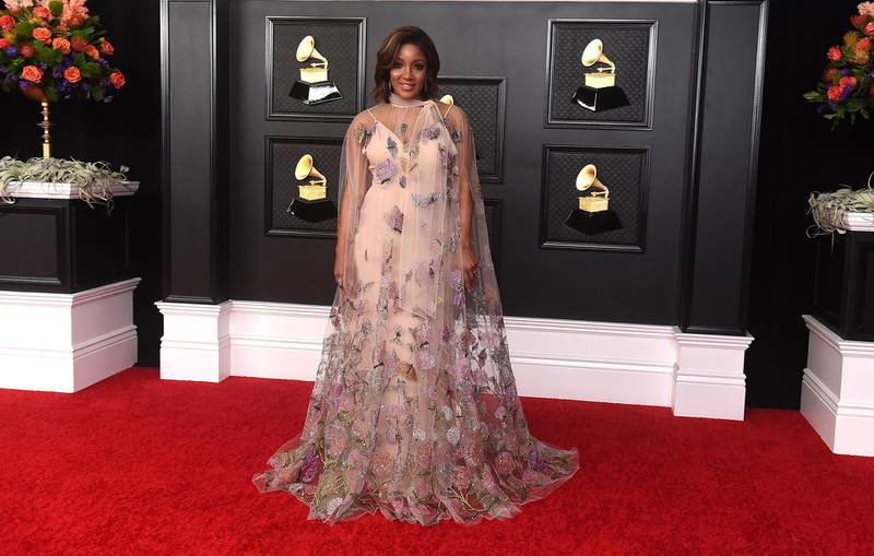 Country singer Mickey Guyton stuck with the spring theme with her Valentino gown. AP