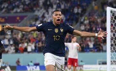 DOHA, QATAR - NOVEMBER 26: France striker Kylian Mbappe celebrates after scoring the second goal during the FIFA World Cup Qatar 2022 Group D match between France and Denmark at Stadium 974 on November 26, 2022 in Doha, Qatar. (Photo by Stu Forster / Getty Images)