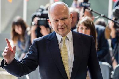 Britain's foreign secretary William Hague gestures as he arrives for an EU foreign ministers meeting at the Kirchberg Conference Center in Luxembourg, Monday, April 22, 2013. (AP Photo/Geert Vanden Wijngaert)