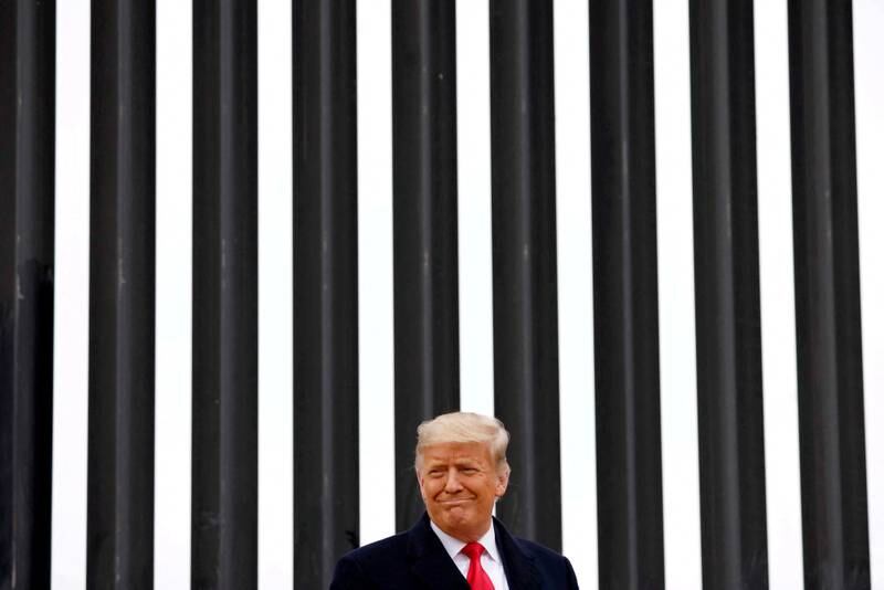 Former US President Donald Trump visits the US -Mexico border wall, in Alamo, Texas, on January 12, 2021. Reuters