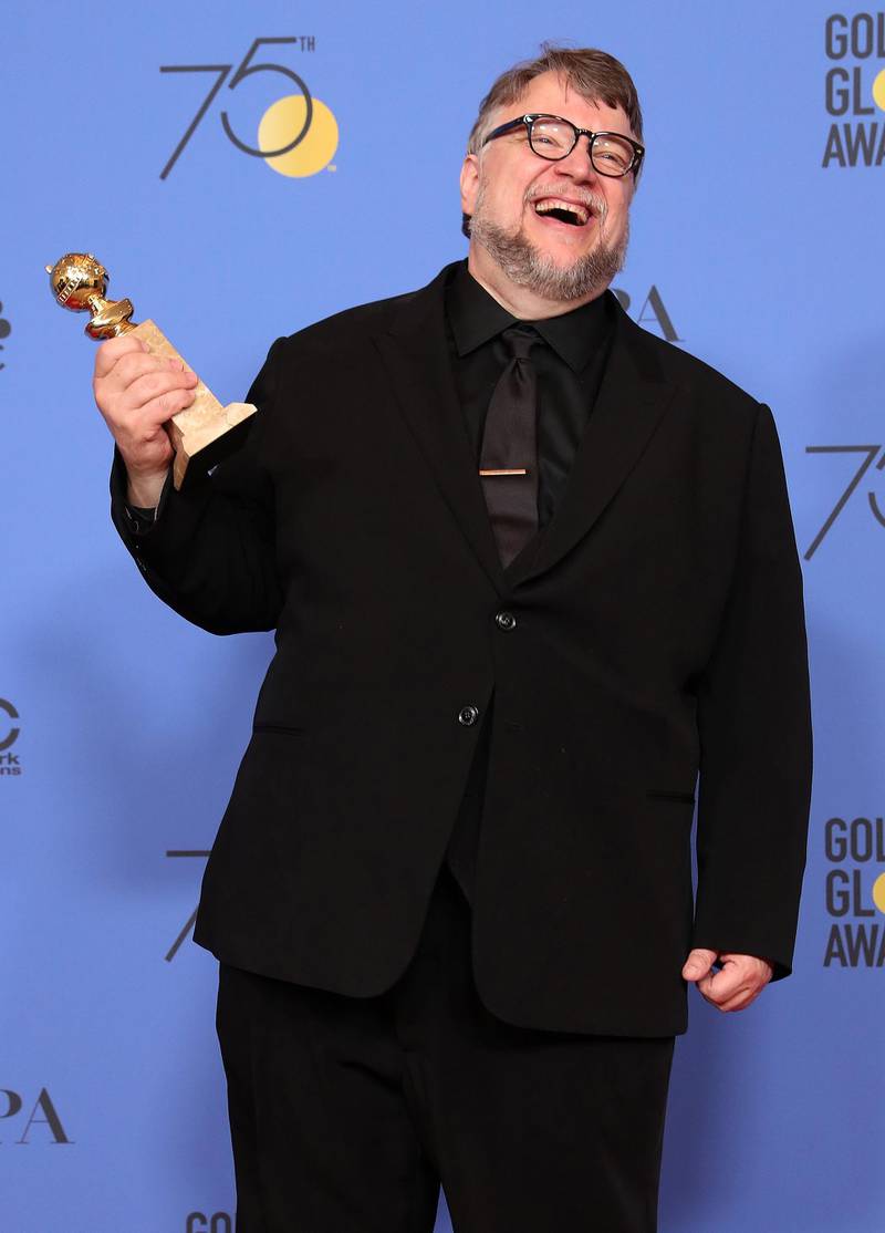 Guillermo del Toro holds the award for Best Director for The Shape of Water. EPA