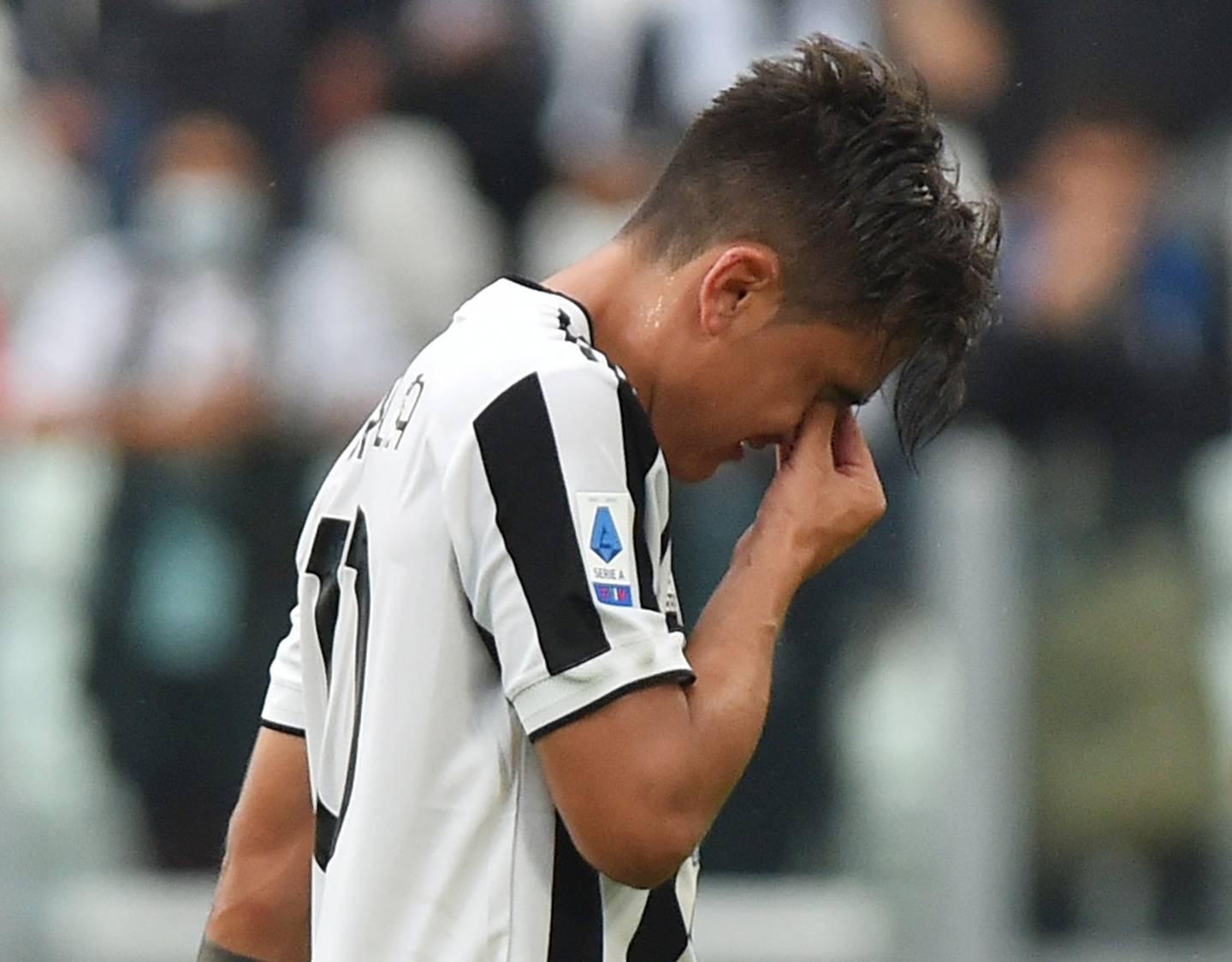 Juventus' Paulo Dybala looks dejected as he is substituted after sustaining an injury. Reuters