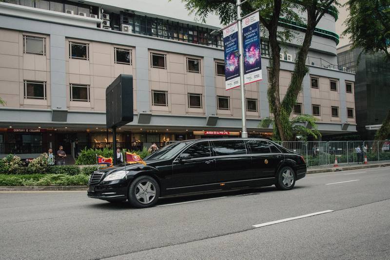 epa06801230 North Korean leader Kim Jong-un leaves the St. Regis Hotel with a motocade to meet with US President Donald J. Trump in Singapore, 12 June 2018. The summit marks the first meeting between an incumbent US President and a North Korean leader.  EPA/TOM WHITE