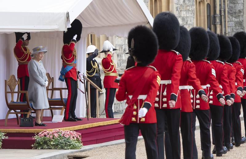 Queen Elizabeth attends a military ceremony in the quadrangle of Windsor Castle to mark her official birthday in June.
