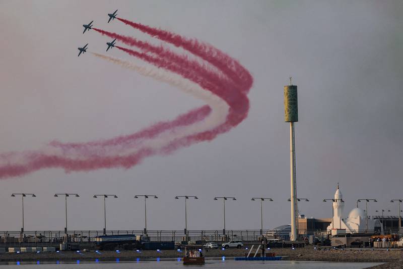 Jets release smoke as they perform an  air display over the  Jeddah Corniche Circuit. AFP