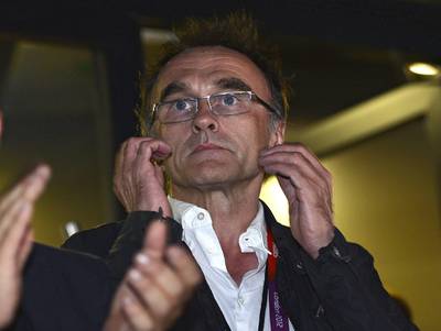 LONDON, ENGLAND - JULY 27:  Danny Boyle, the director of the opening ceremony reacts during the opening ceremony at the Olympic Stadium on July 27, 2012 in London, England.  (Photo by Toby Melville  - IOPP Pool /Getty Images) *** Local Caption ***  149375332.jpg