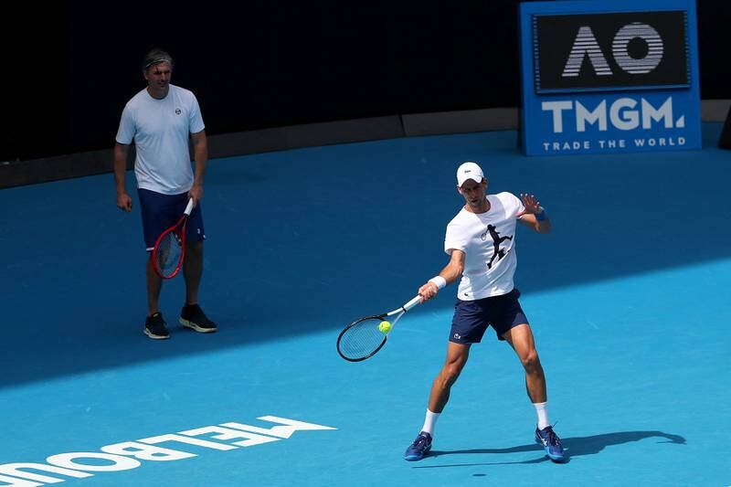 Serbia's Novak Djokovic hits a ball. AFP