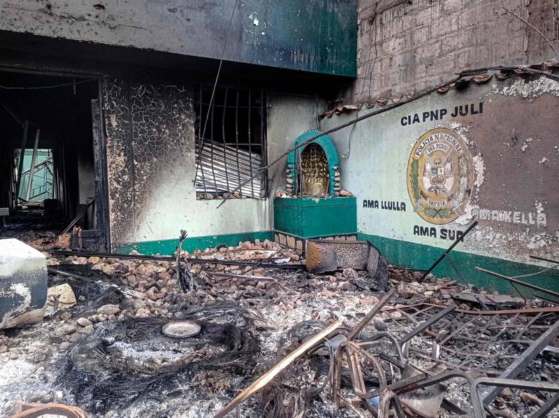 This Peruvian police station was burnt during clashes between police and demonstrators protesting against President Boluarte. AFP