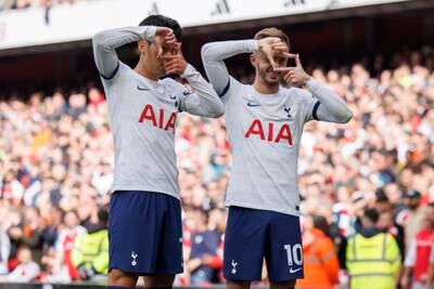 Heung-min Son and James Maddison of Tottenham celebrate after Spurs made it 2-2. EPA