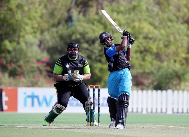 Dubai, United Arab Emirates - Reporter: N/A. Sport. Cricket. ECB Blues' Vriitya Aravind hits a four during the match between the ECB Blues and Dubai in the Emirates D10. Friday, July 24th, 2020. Dubai. Chris Whiteoak / The National