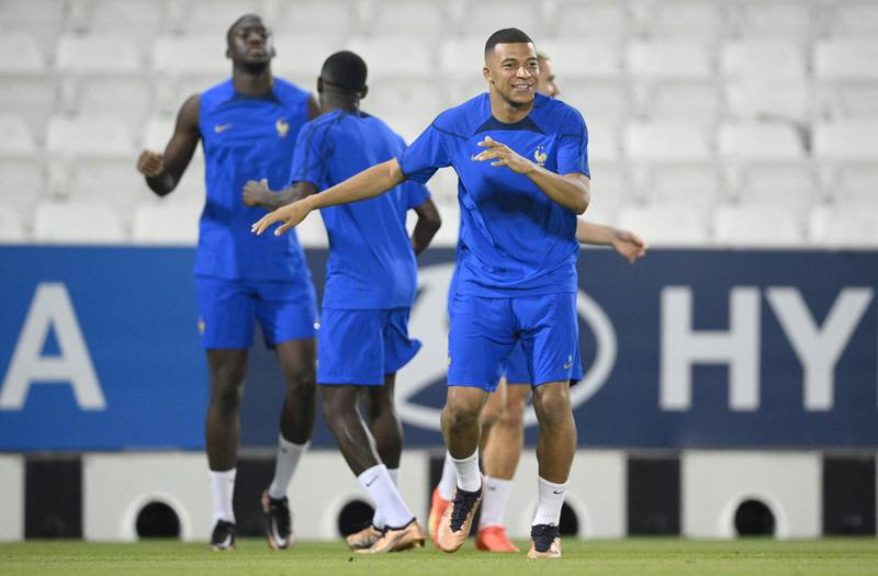 Kylian Mbappe and his France teammates takes part in a training session. AFP