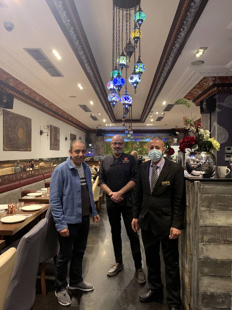 Magdy Khalil, left, owner of Al Basha restaurant in Knightsbridge, and Elias Sawaya, centre, head chef at the restaurant. Mr Khalil said the business is suffering because of cancellations caused by the Omicron variant. Photo: The National