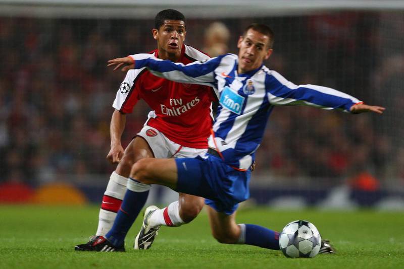 Denilson, left, in action during his Arsenal days. The Brazilian will soon complete a move to Al Wahda. Mike Heiwtt / Getty