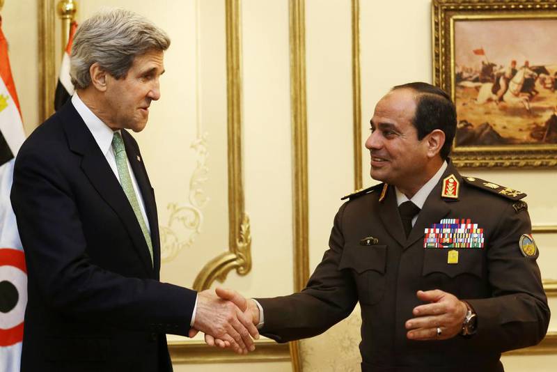 US secretary of state John Kerry, left, met the Egyptian defence minister Abdel Fattah El Sisi in Cairo last March. Jacquelyn Martin / AP Photo