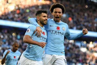 MANCHESTER, ENGLAND - NOVEMBER 05: Sergio Aguero of Manchester City celebrates scoring his sides second goal with Leroy Sane of Manchester City during the Premier League match between Manchester City and Arsenal at Etihad Stadium on November 5, 2017 in Manchester, England.  (Photo by Laurence Griffiths/Getty Images)