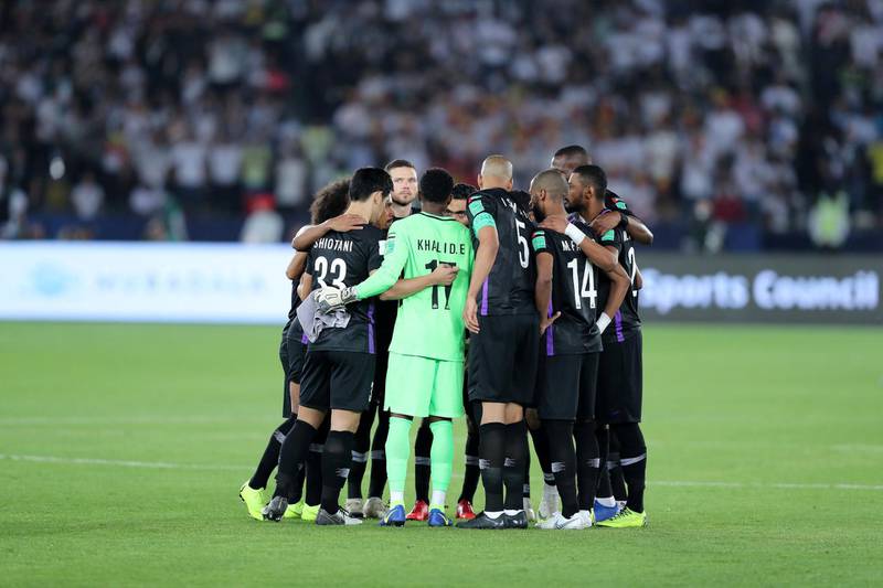 Abu Dhabi, United Arab Emirates - December 22, 2018: Al Ain have a huddle before the match between Real Madrid and Al Ain at the Fifa Club World Cup final. Saturday the 22nd of December 2018 at the Zayed Sports City Stadium, Abu Dhabi. Chris Whiteoak / The National
